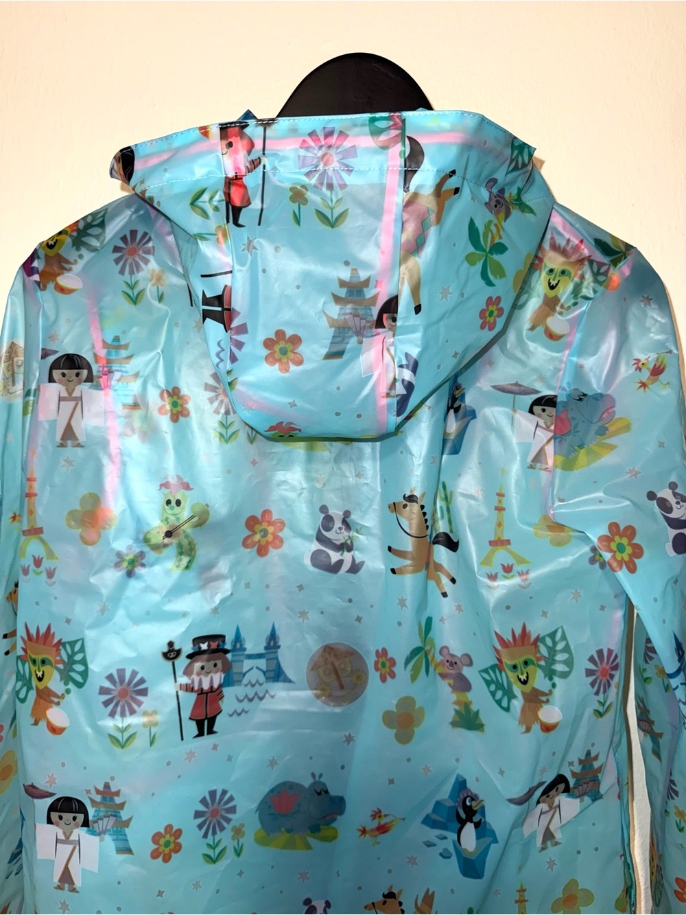 Disney Parks translucent blue “It’s a Small World” Raincoat, size S, EUC - Picture 4 of 6